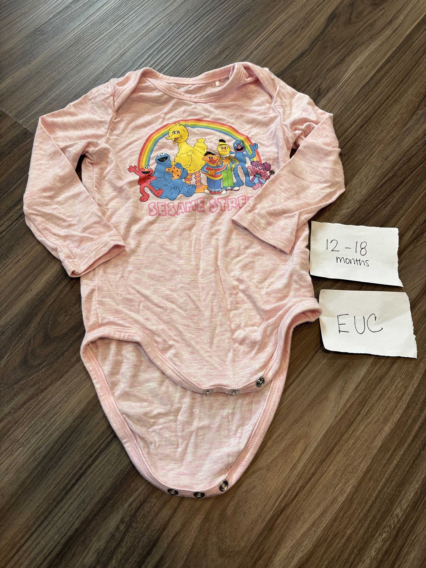 #138 - 12-18 Mo - Little Sleepies (Bamboo) EUC Sesame Street LS onesie