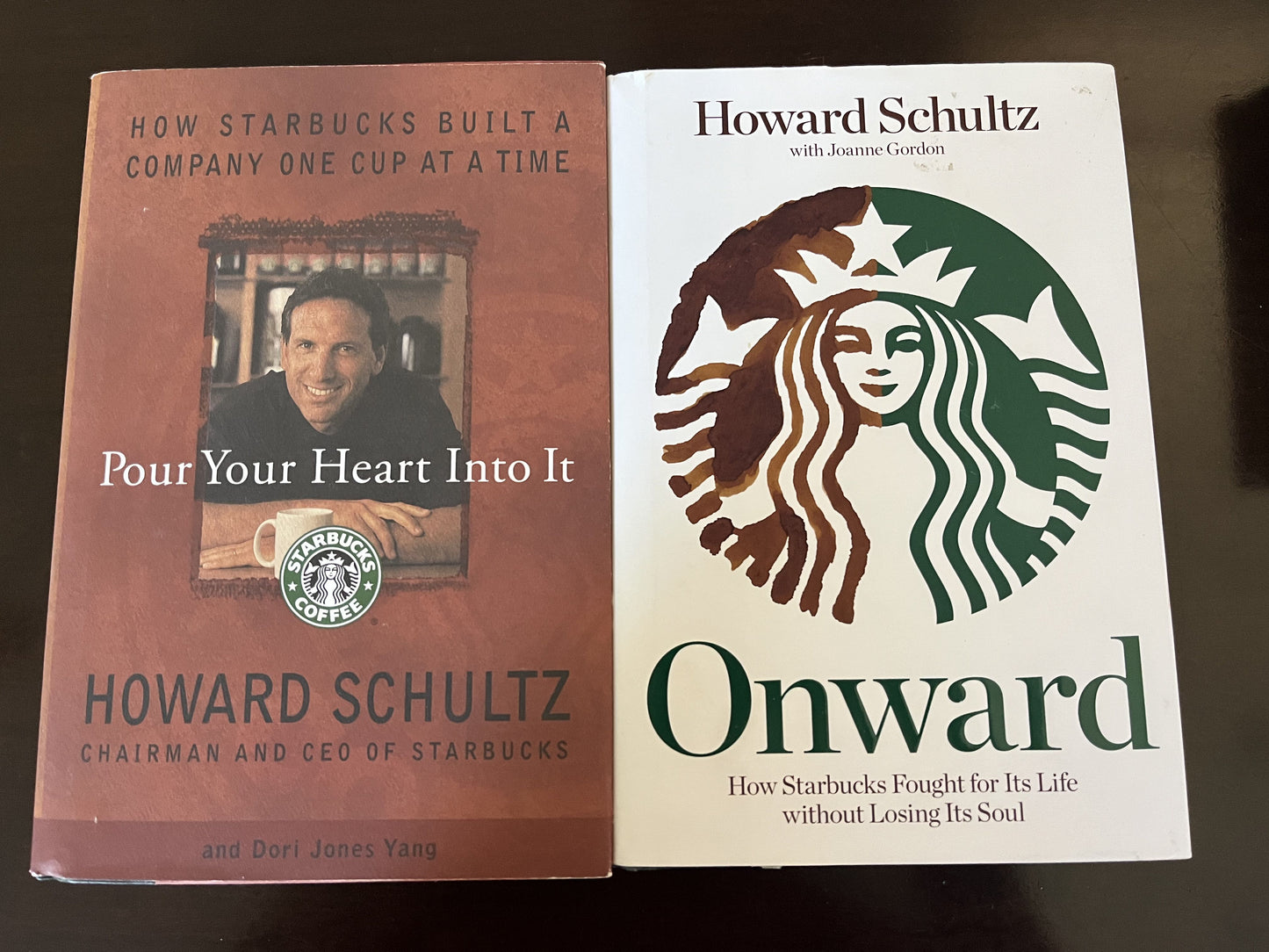 #124 Onward and Pour Your Heart Into It, 2 Hard Cover Books by Starbucks CEO Howard Schultz