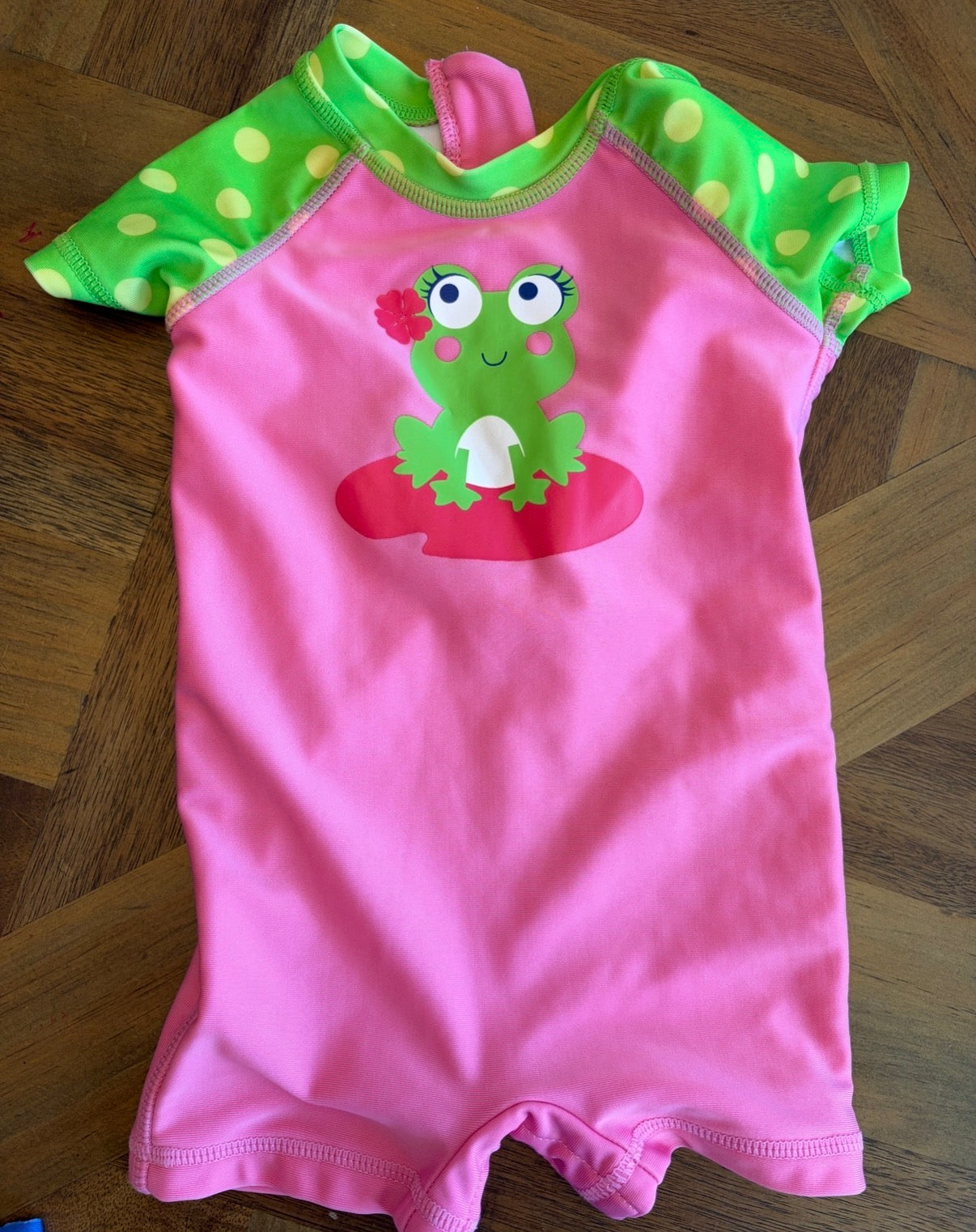 Seller 22 6-9 mo frog swimsuit