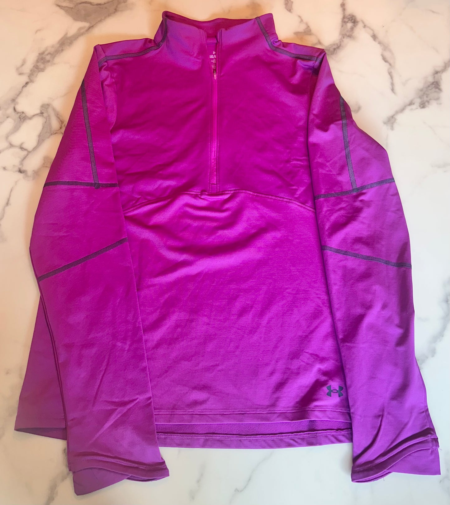 Seller #65 Women’s Large Under Armour half zip top