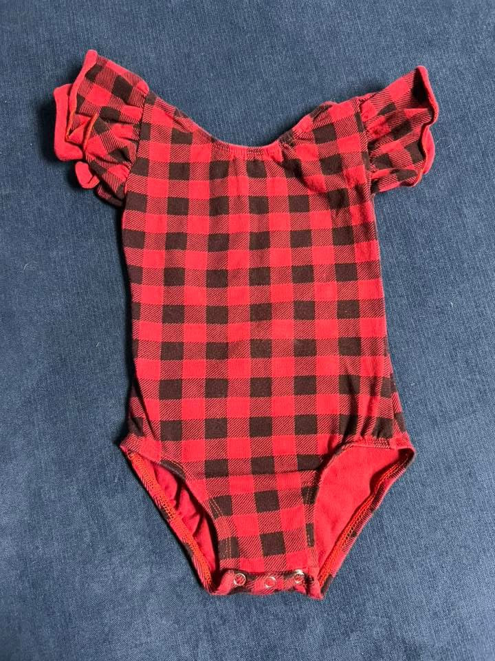 #66 girls Chloe and Piper Buffalo Plaid bodysuit. No size listed but fits like 18mo. Snaps at crotch, ruffle sleeve, VGUC
