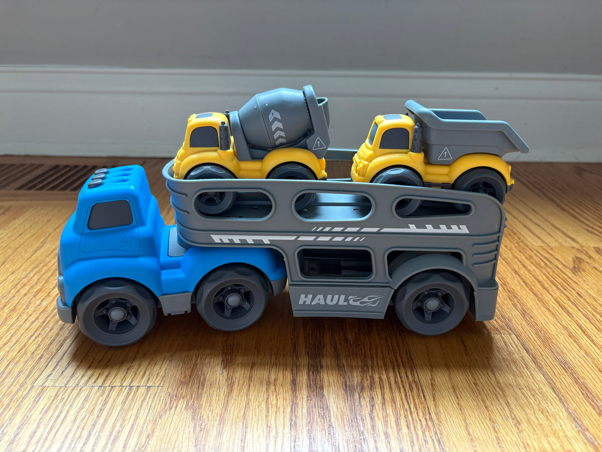 #22 Truck trailer with construction vehicles