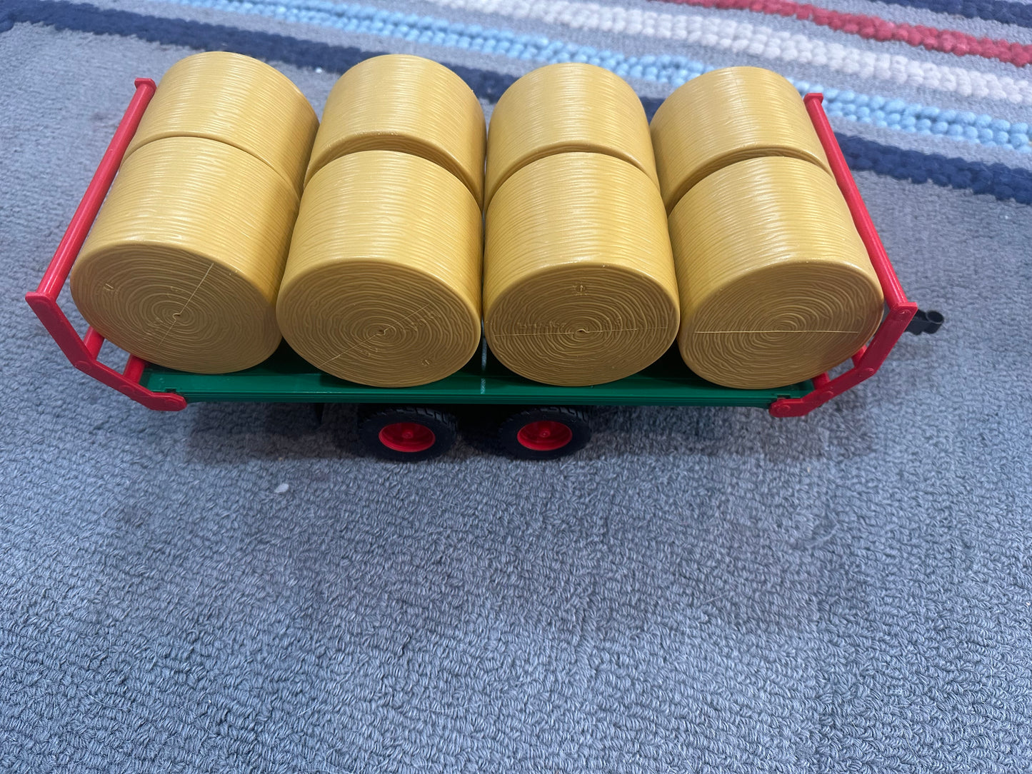 #24 Bruder trailer with hay bales