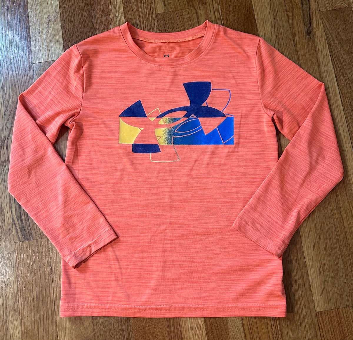 Seller #101 Under Armour boys size 7 dri fit orange long sleeve