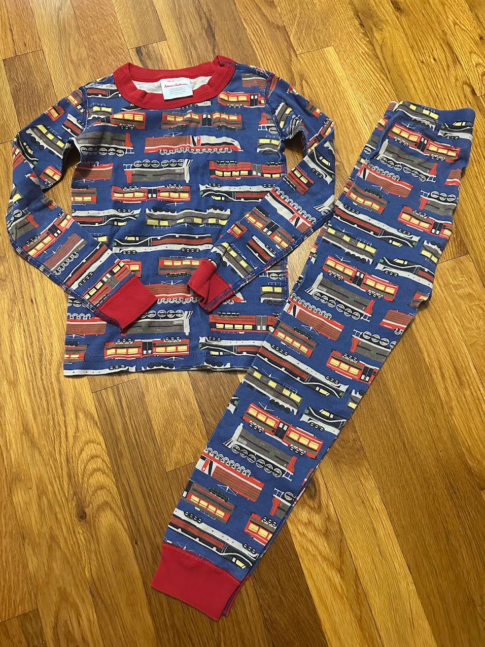 Seller #101 Hanna Andersson size 6-7 train pajamas