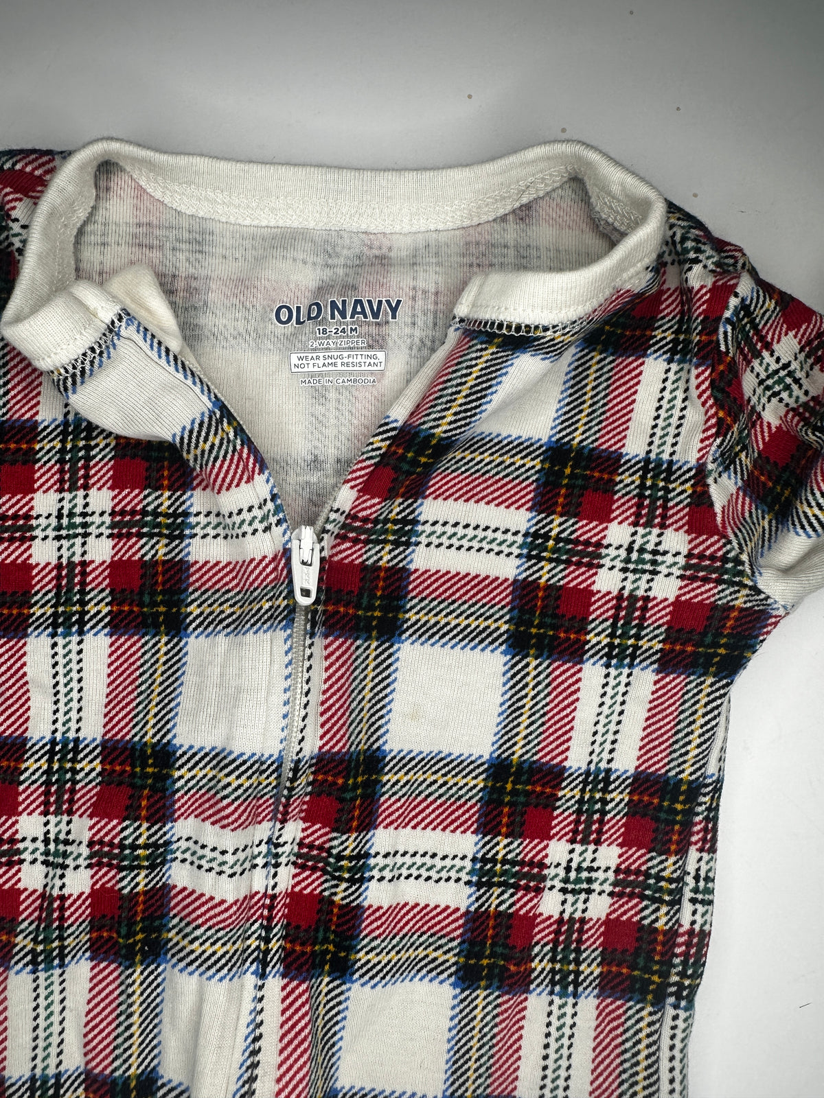 Seller #40 Old Navy Christmas footie pajamas size. 18-24 month