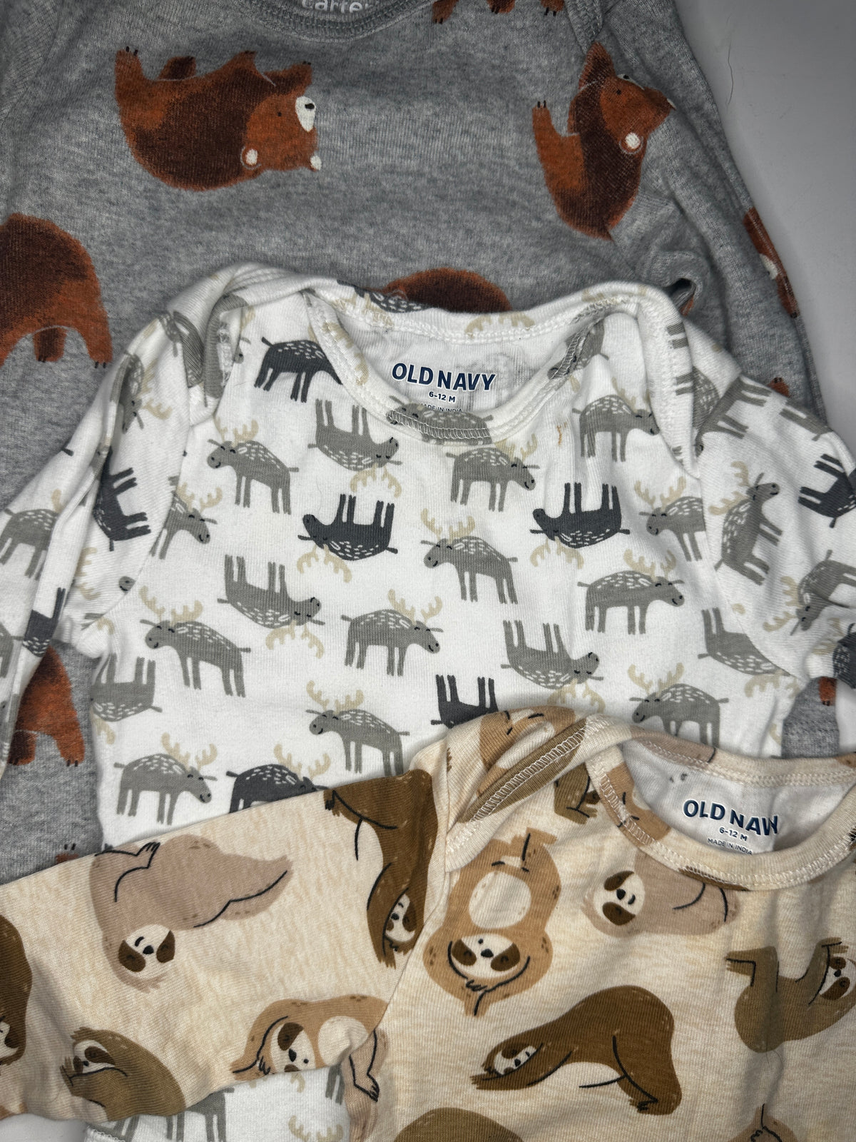 Seller #40 Carter's long0sleeve onesie bundle size 12 month