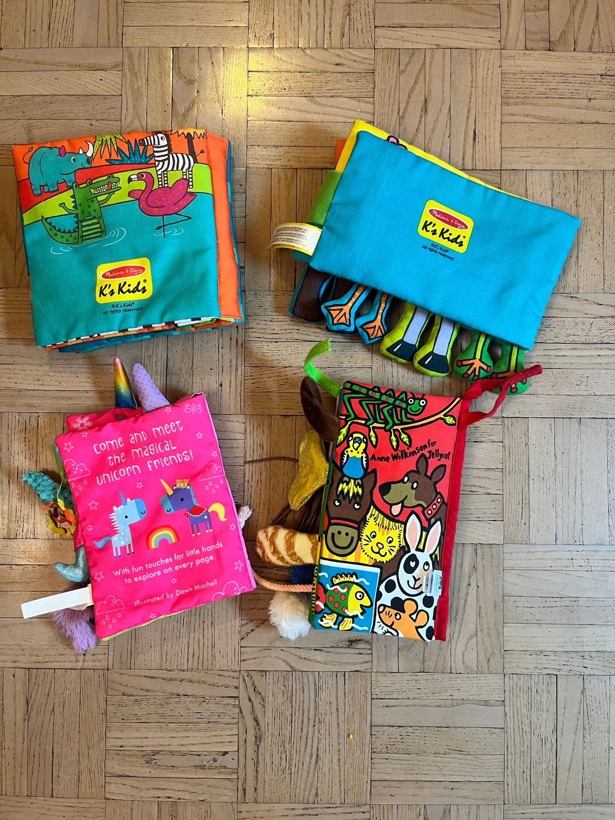 #195 Jelly Cat and Melissa and Doug Soft Sensory Books, set of four