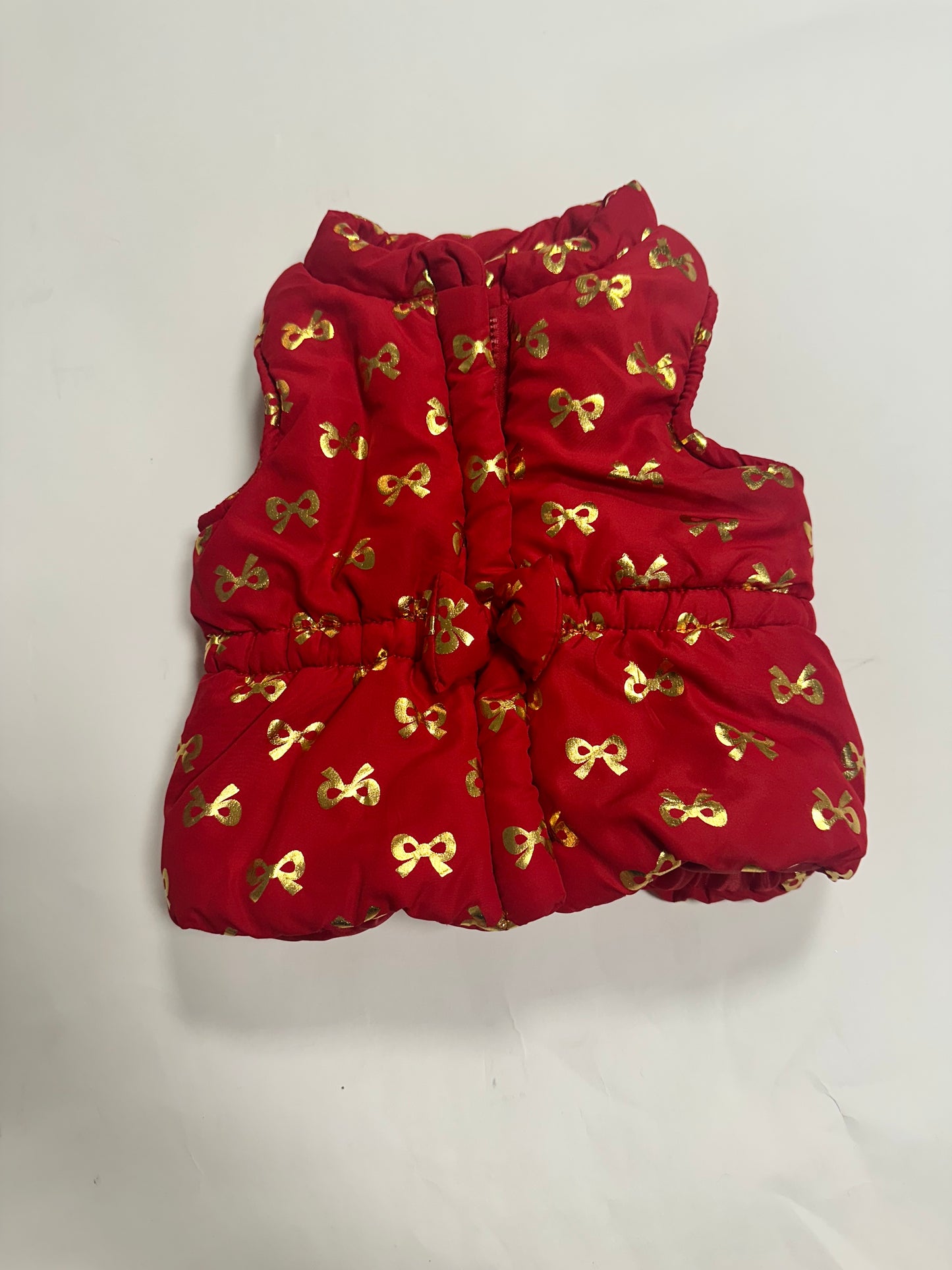 #87 red and gold bow puffer vest 6-9month