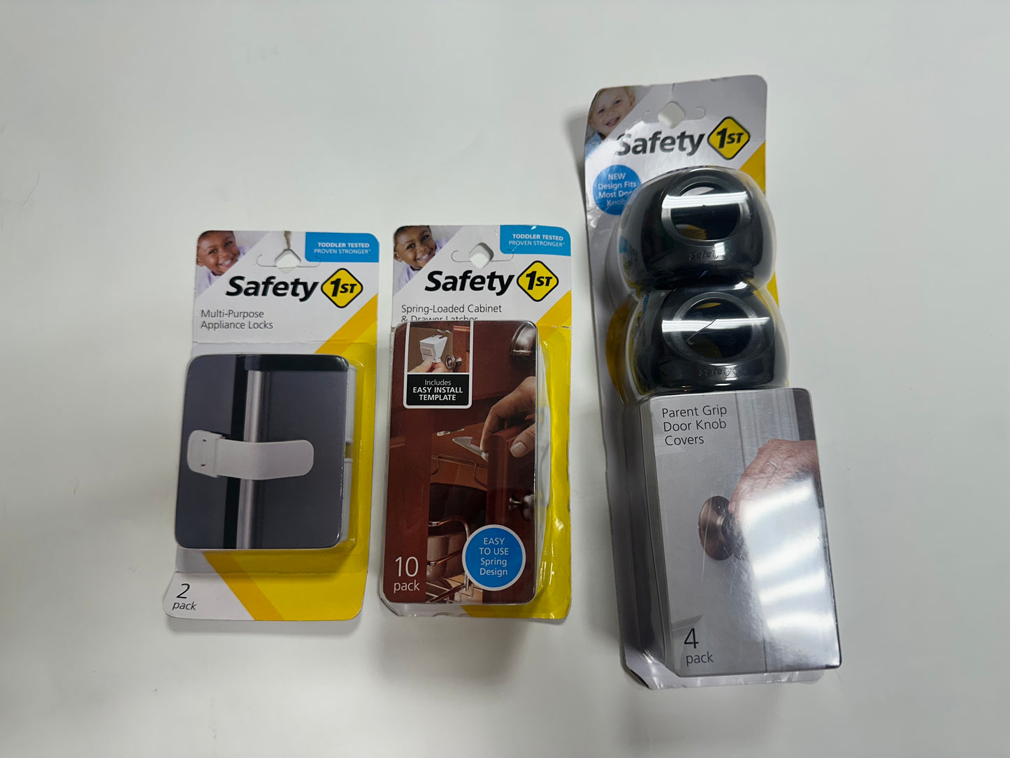 #87 Safety first set of 3 baby proofing devices, new
