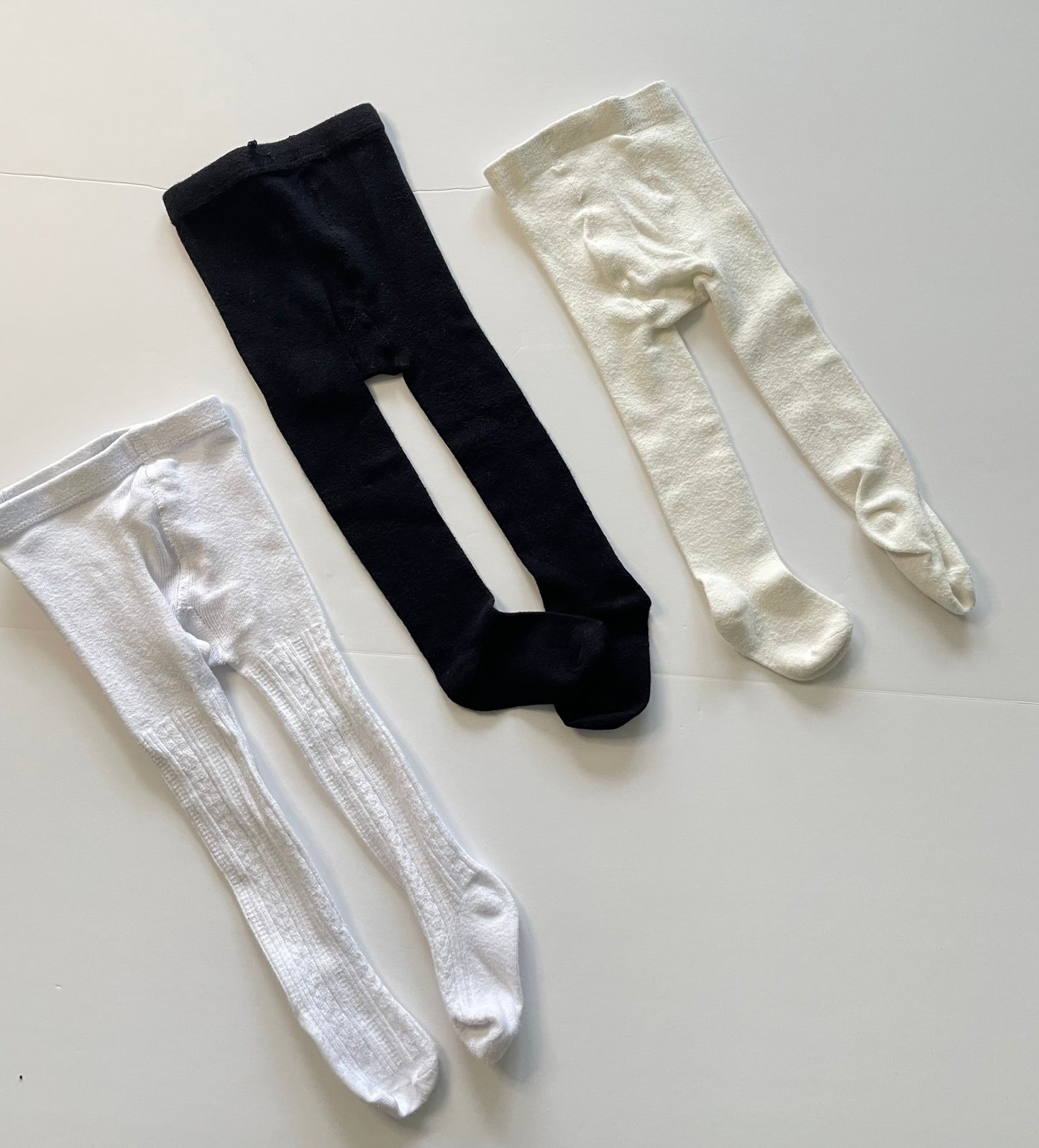 #121 Girls 12-24M set of three tights, white black cream, EUC