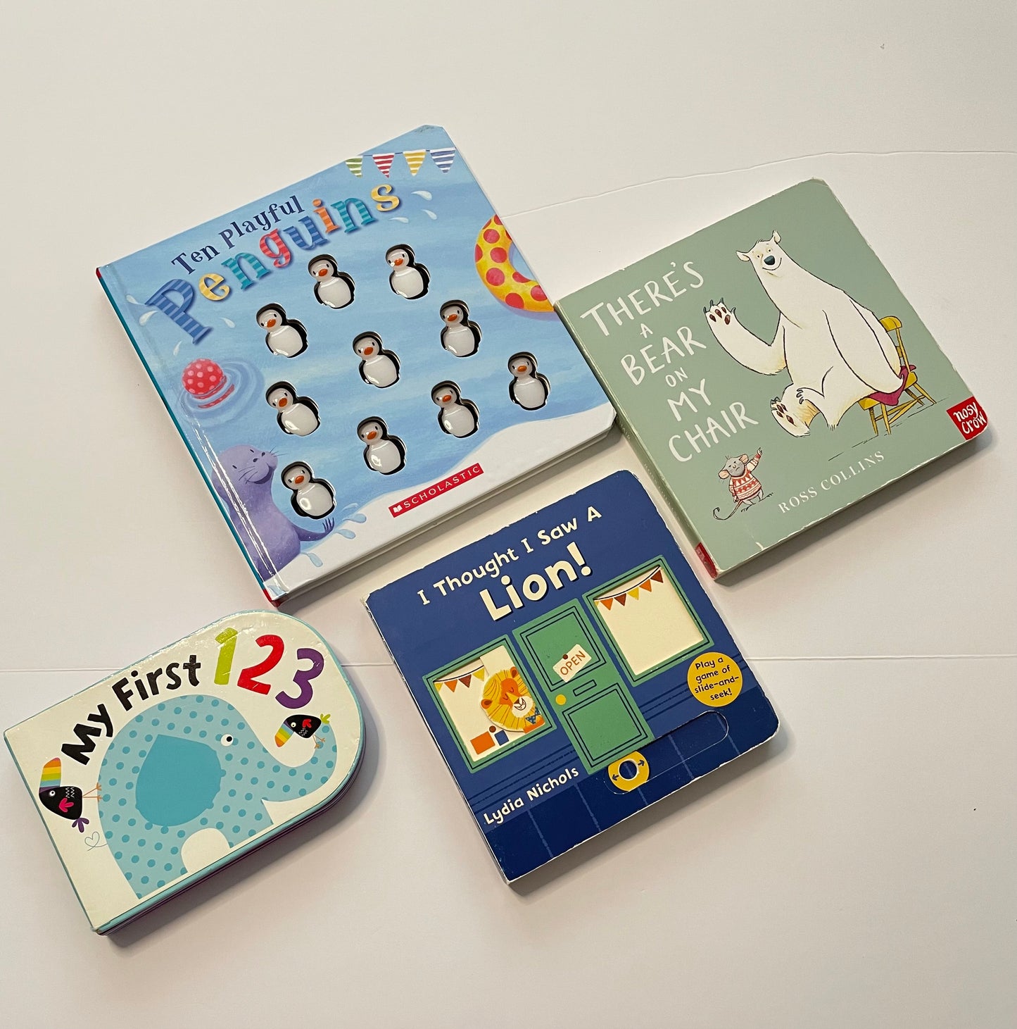 #121 Set of 4 board books, Ten Playful Penguins, There's a Bear in My chair, I Thought I Saw a Lion, My First 123, VGUC