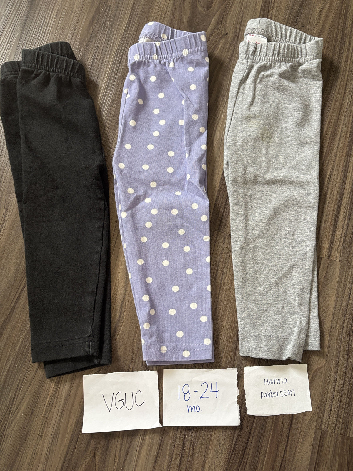 #138 - 18-24 Mo VGUC (3) Hanna Andersson Leggings (black, gray, purple)