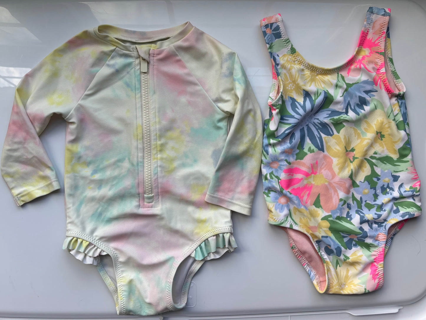 #122 Girls 6-12m old navy swim suit bundle
