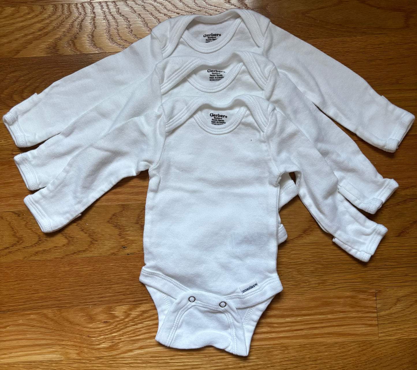 Seller #64 Gerber Newborn White Long Sleeve Onesie set of 3