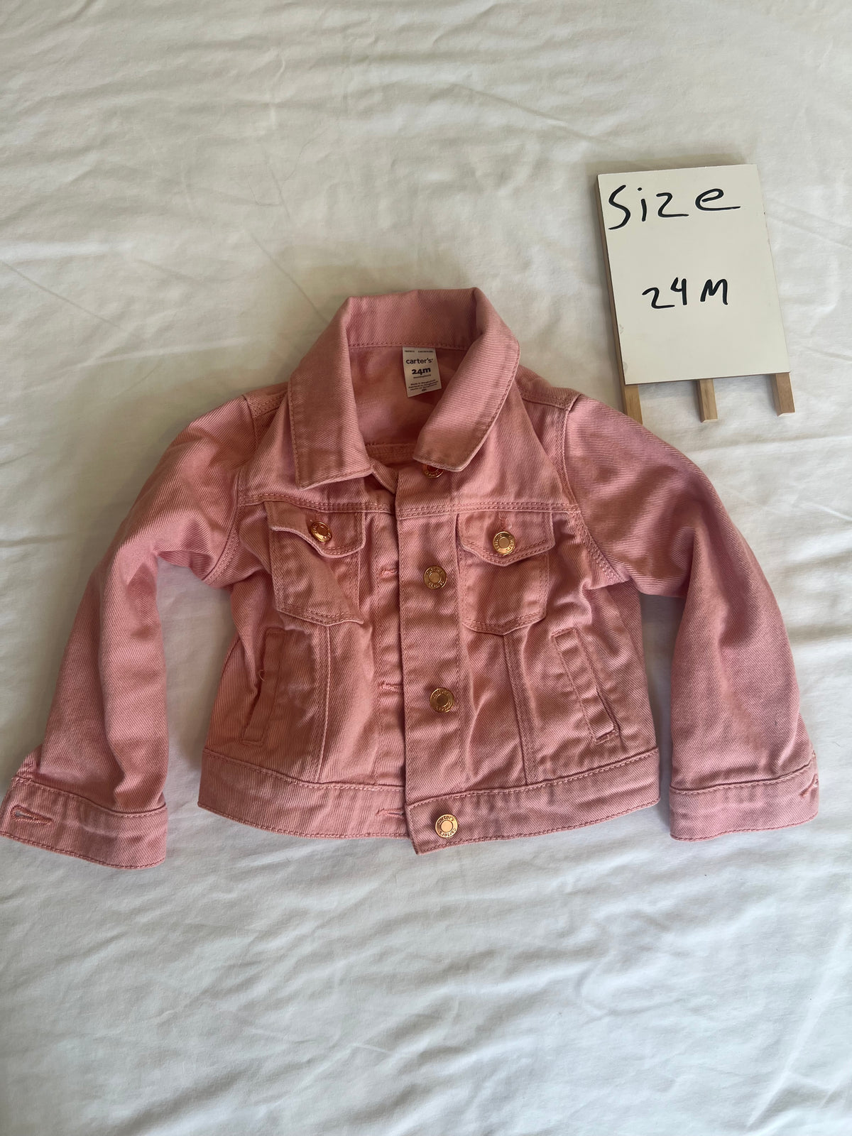 #24 size 24m pink denim jacket with rose gold hardware