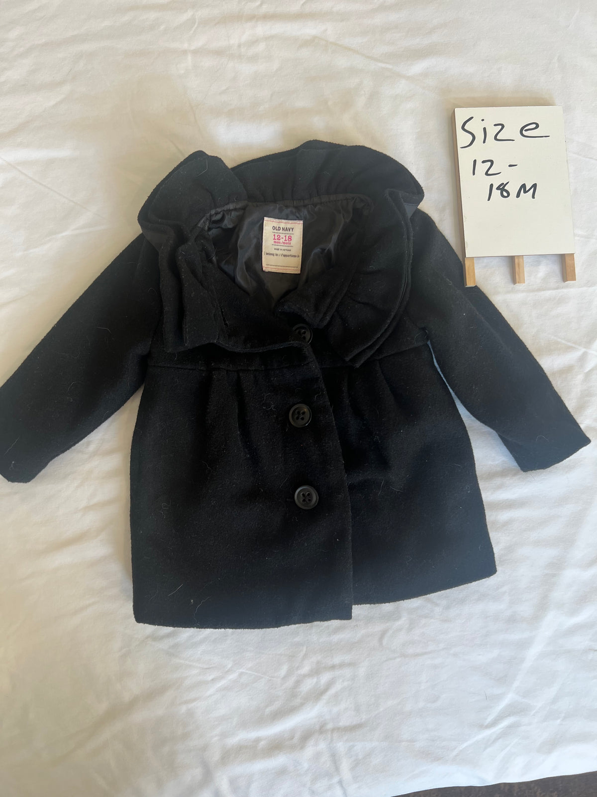 #24 size 12-18 months black coat