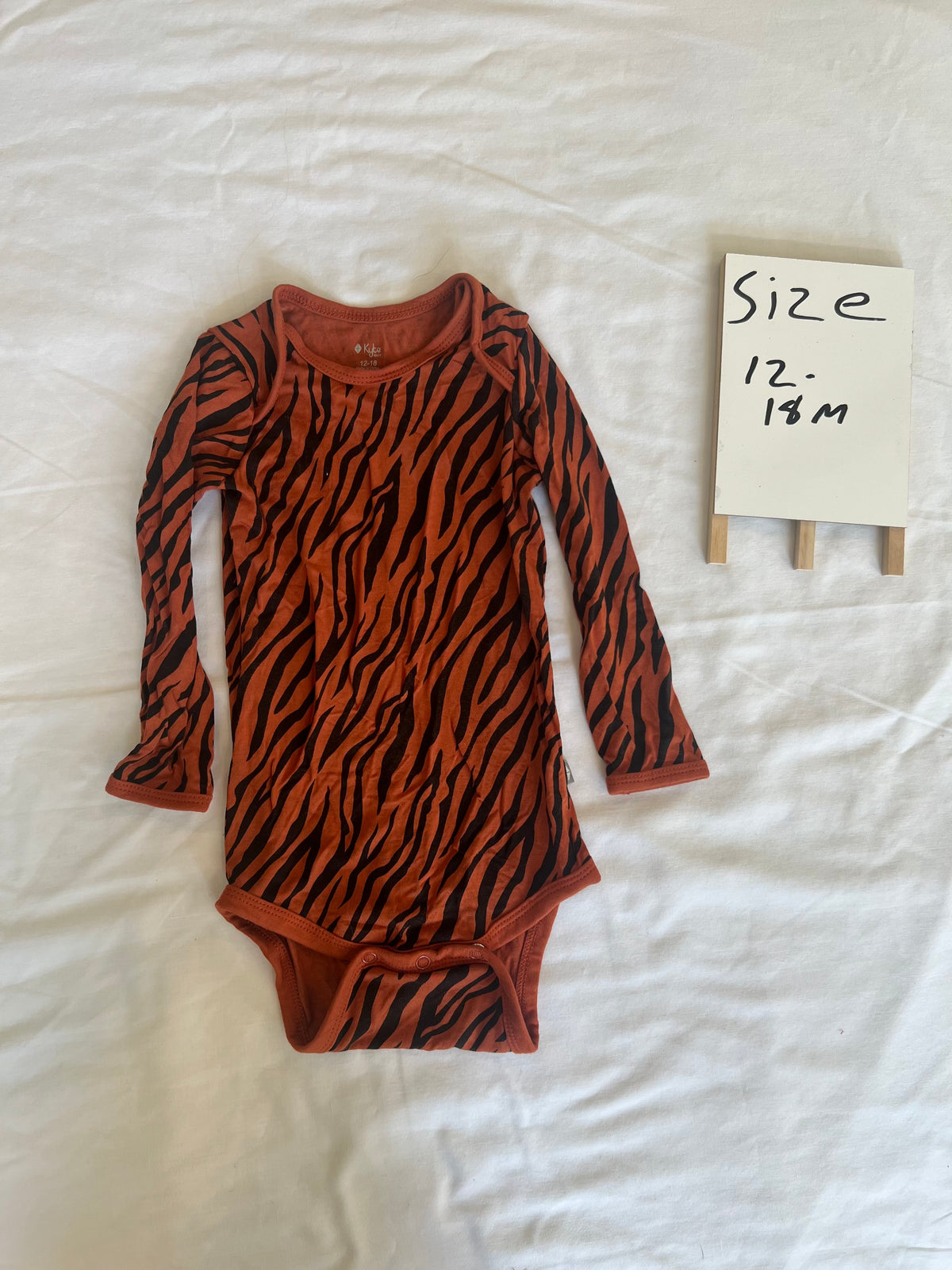 #24 size 12-18 months kyte baby bengals onesie