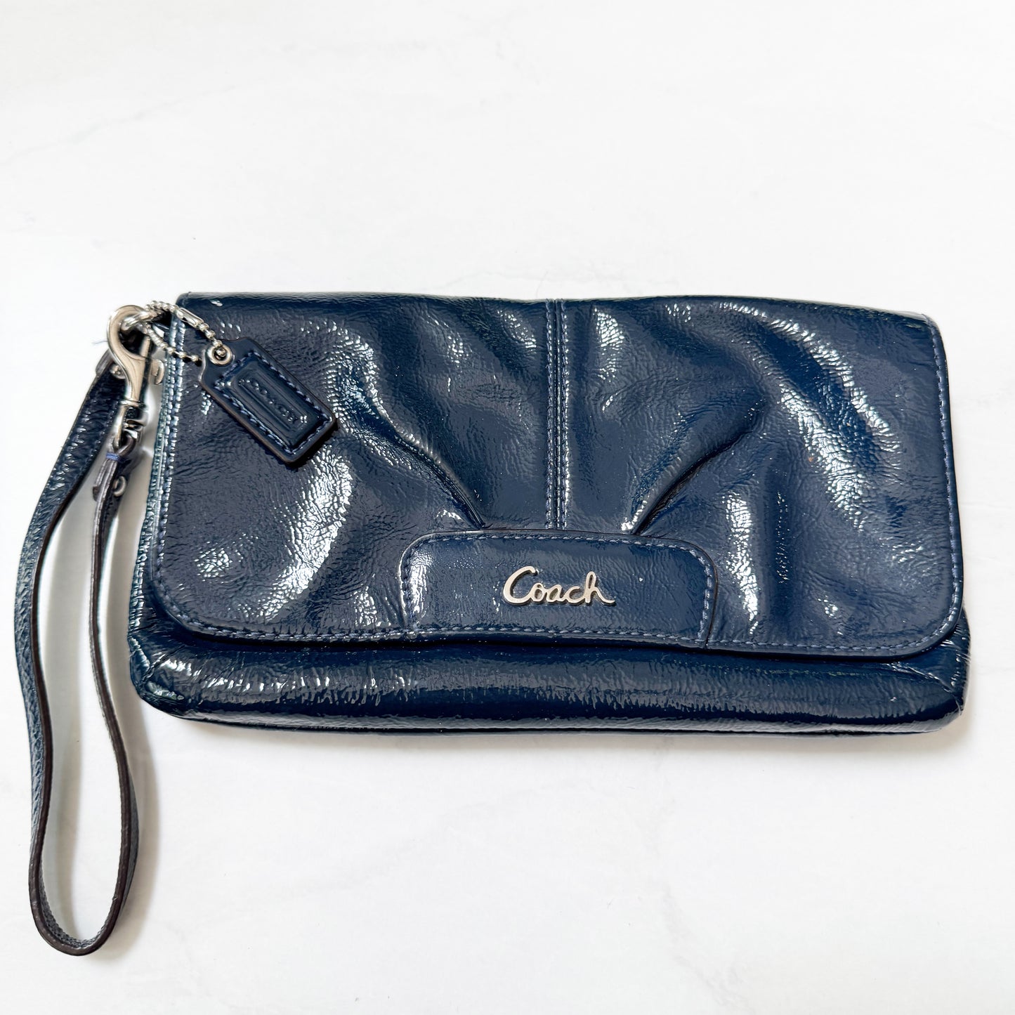 Seller 196 Coach teal vintage wristlet