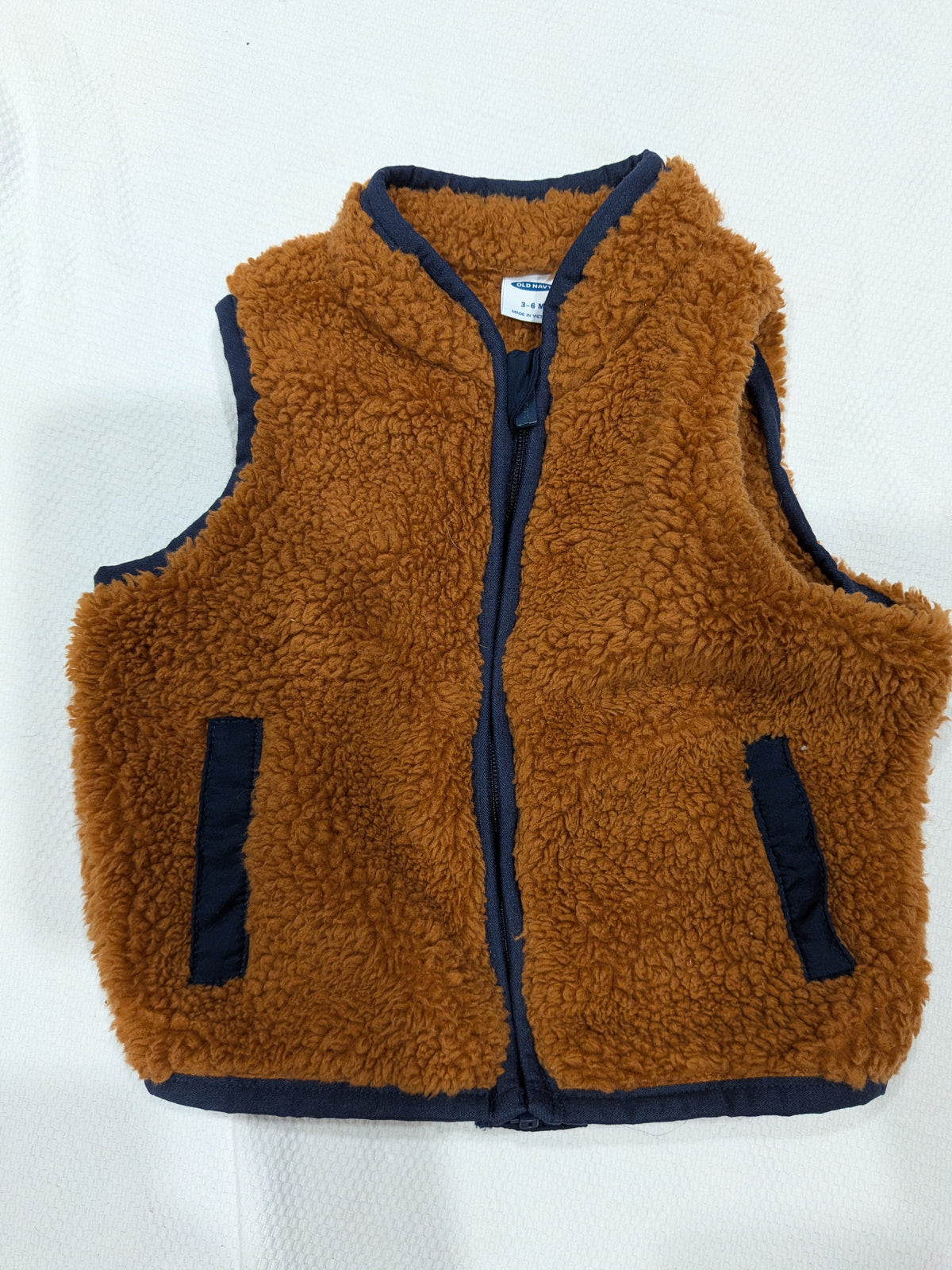 Seller 2. Old navy brown vest, boys size 6 months