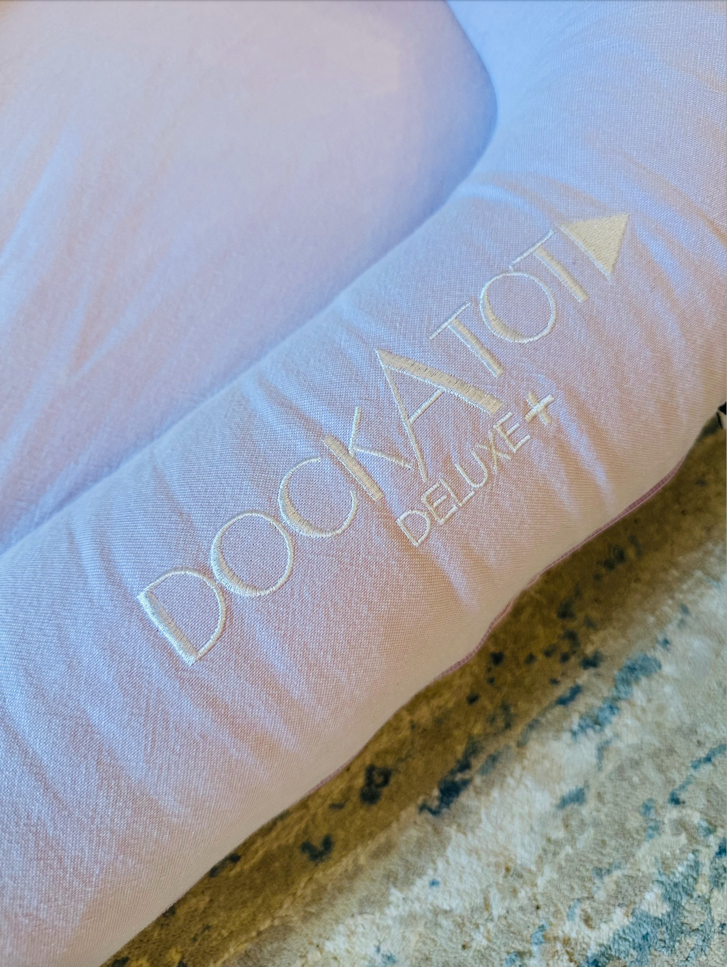 Seller #51: DockATot Deluxe+ in Lovely Lilac Chambray