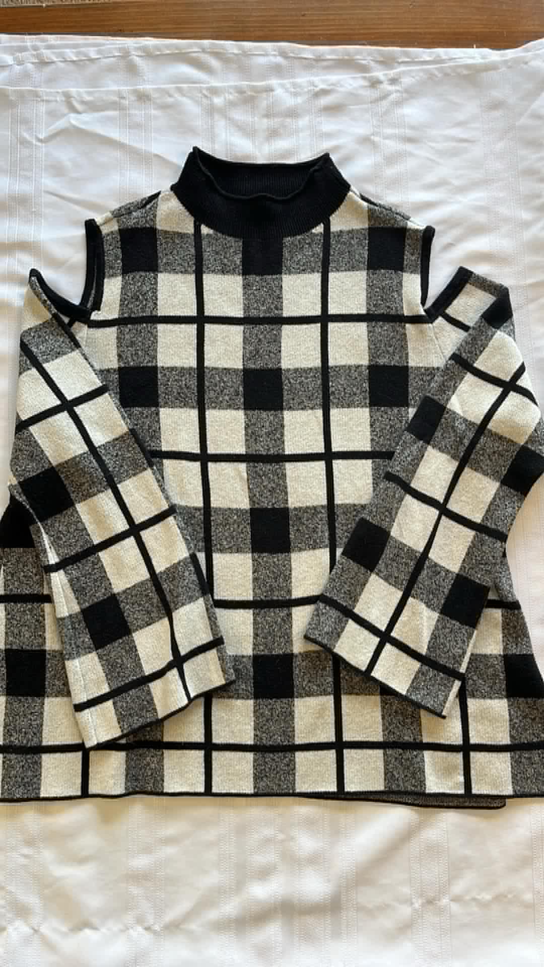 #29 Women’s size L open shoulder sweater