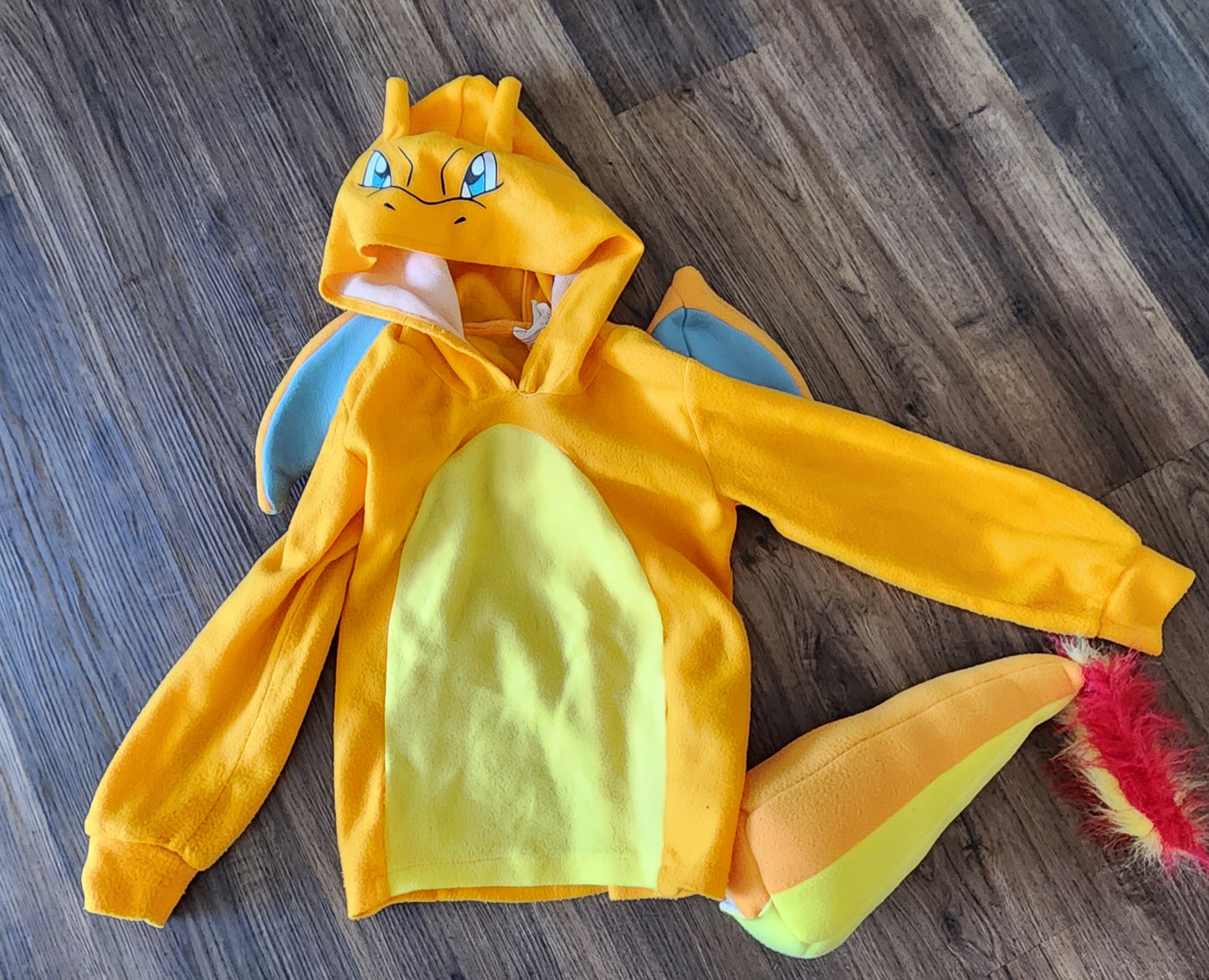 #31 Pokémon Charizard costume boys large (we stuffed the tail)