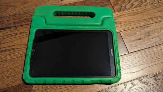 Samsung Galaxy Tab E tablet with green foam handle case