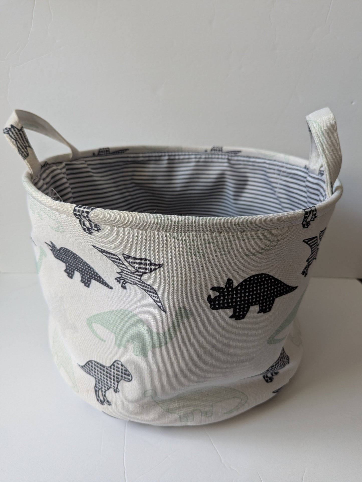 #17 Dinosaur Round Basket with blue/white striped lining