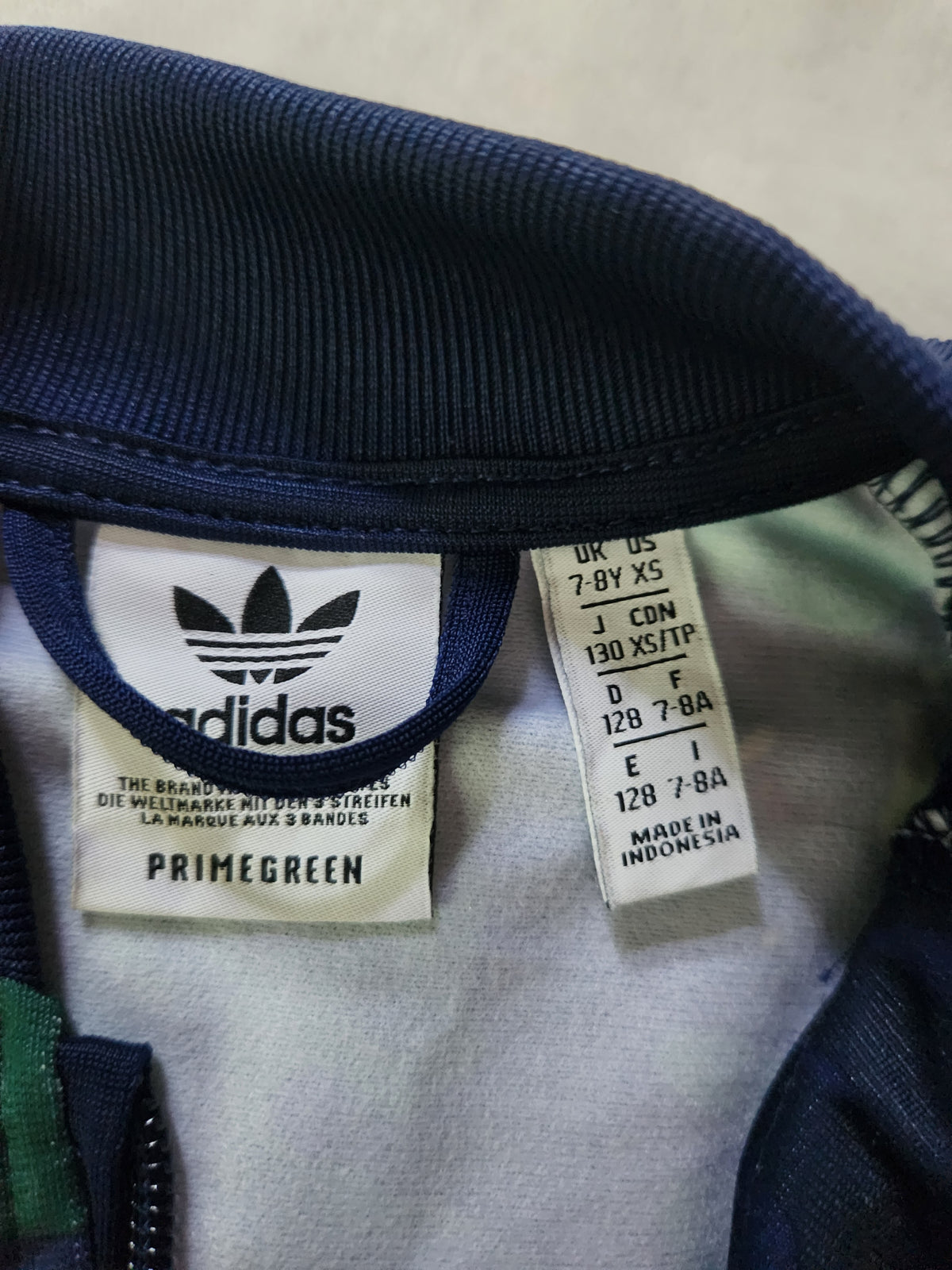 #167 Adidas 7/8 Camo Print Primegreen SST Track Jacket