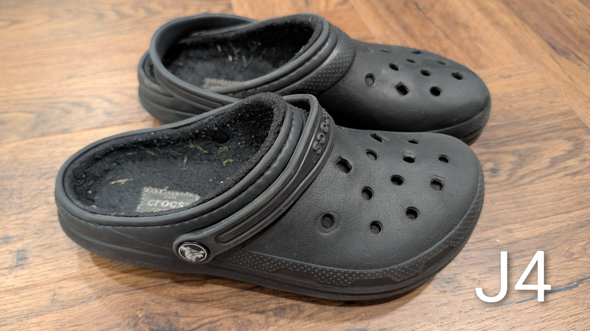 #3 Lined black Crocs, size J4