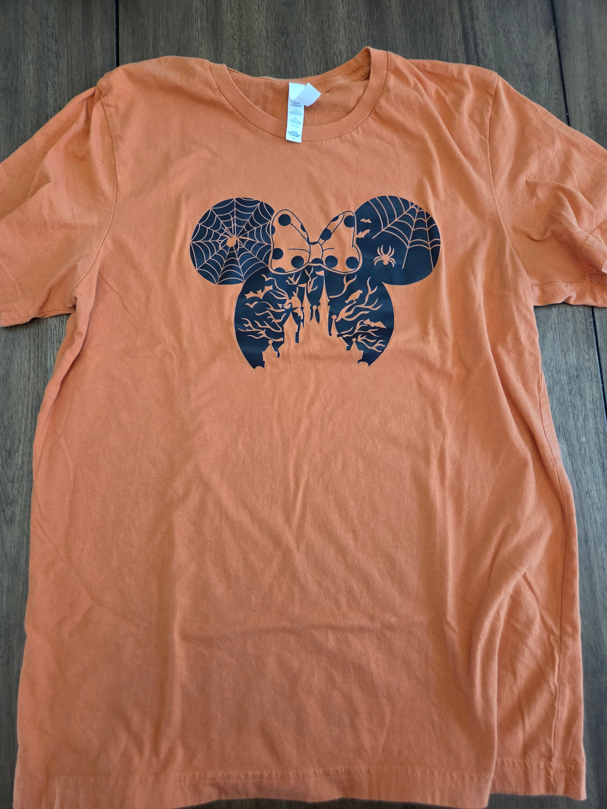 Seller 188 Women's L/XL Disney tops