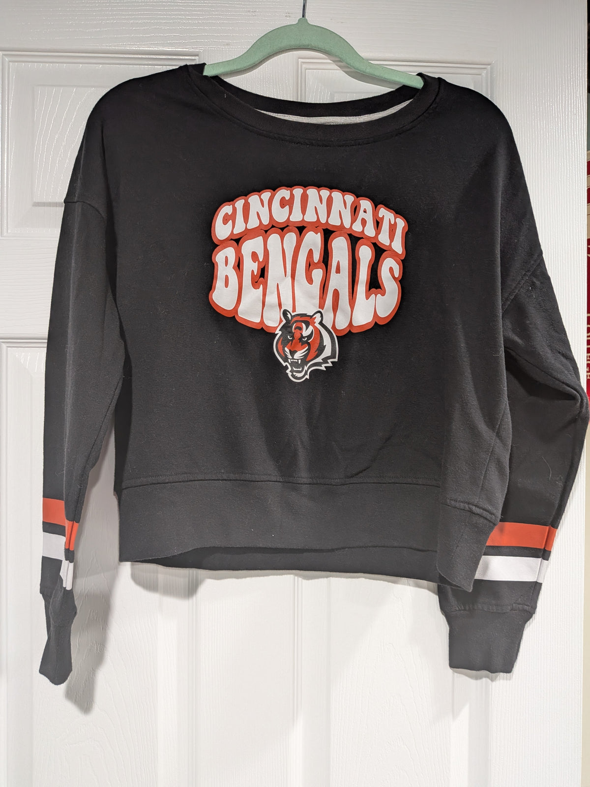Seller 2. Girls bengals sweatshirt size XL