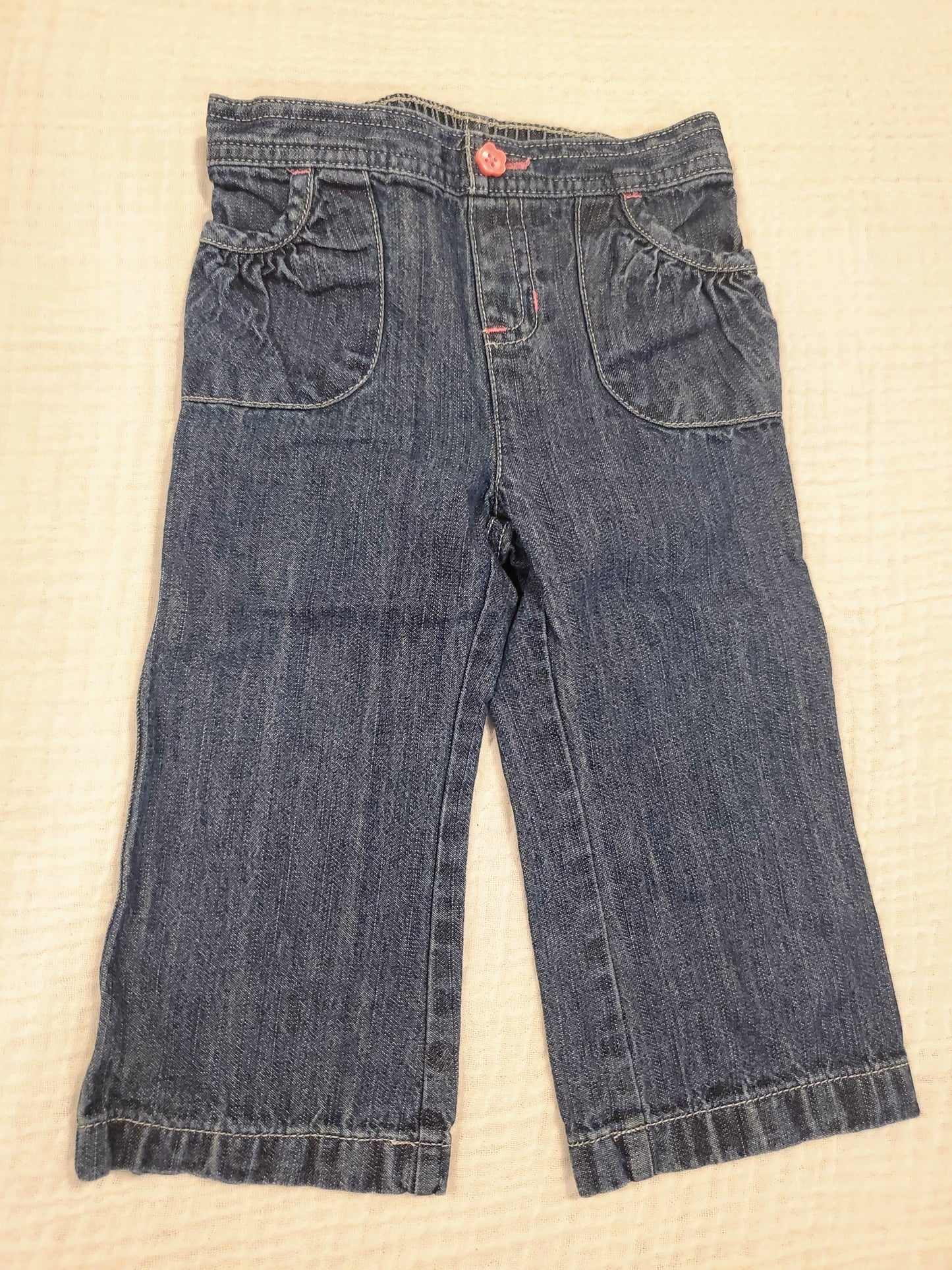 #58 Jumping Beans jeans with pink button and pockets girls size 18M