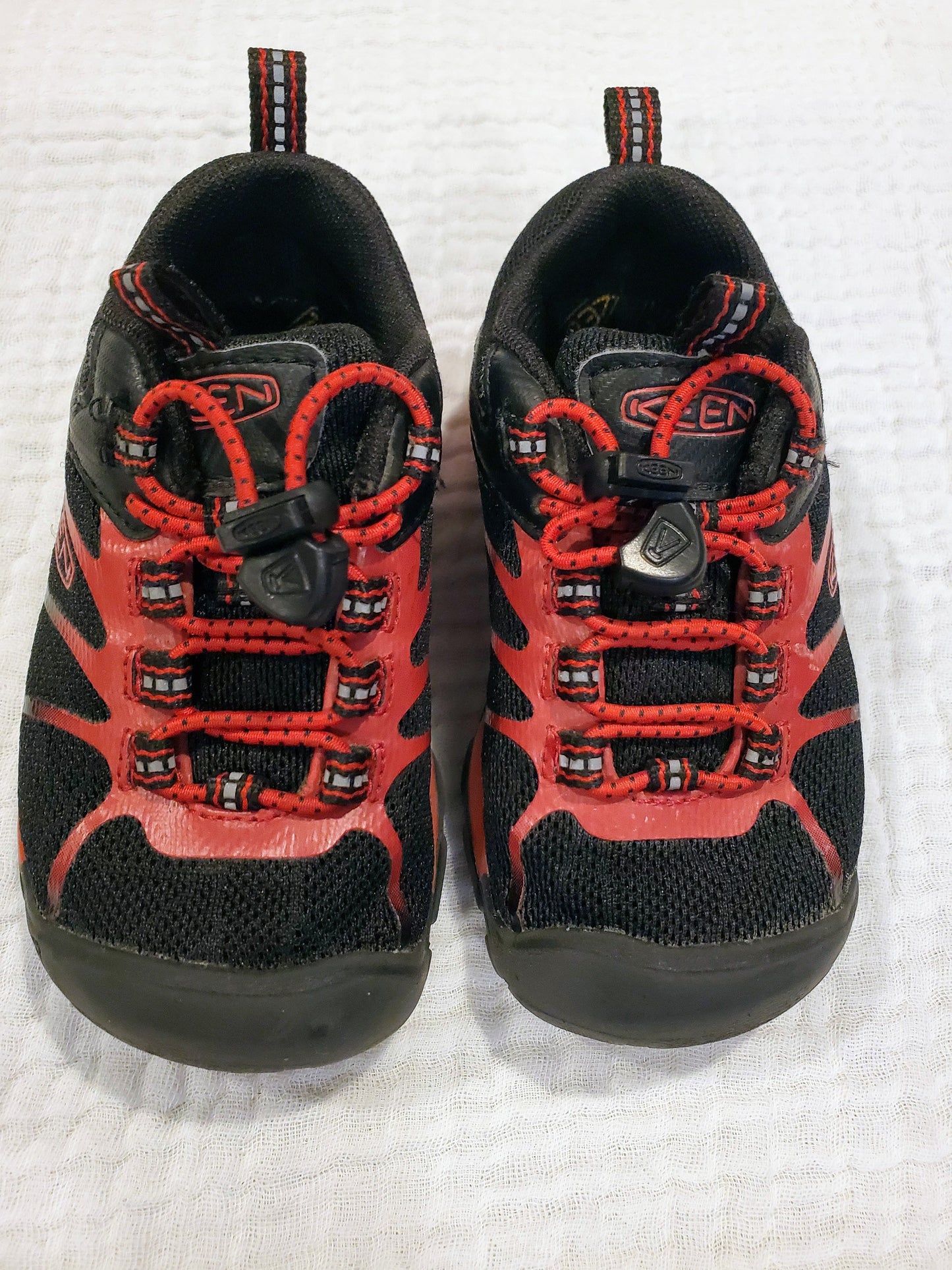 #58 Keen red & black tennis or hiking shoes with rubber toes and bungee laces Toddler Boys Size 8