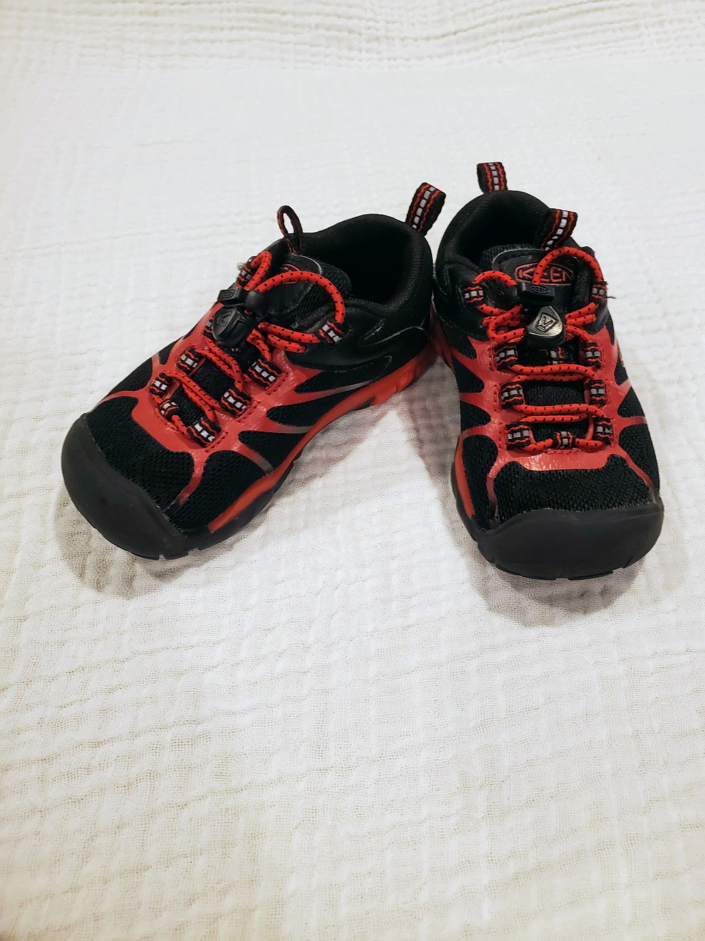 #58 Keen red & black tennis or hiking shoes with rubber toes and bungee laces Toddler Boys Size 8