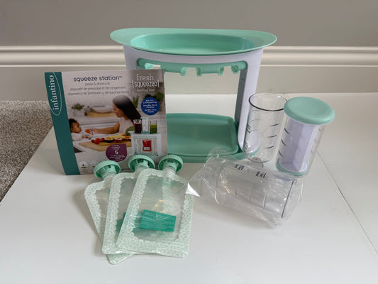 #153 Infantino Squeeze Station - used once