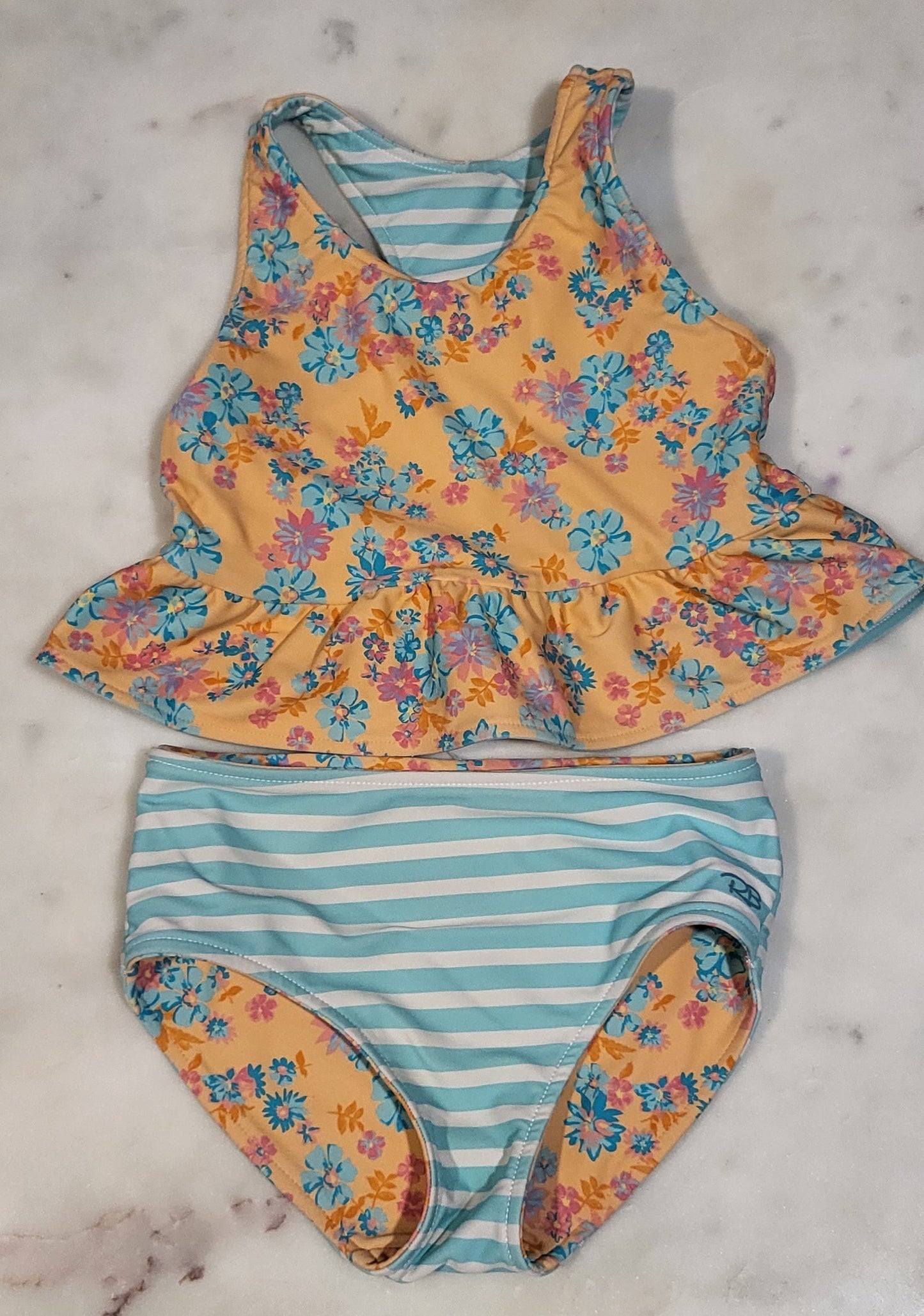REDUCED: #9--- Girls 5. Rufflebutts Vibrant Valley Reversible Peplum Tankini Swim.