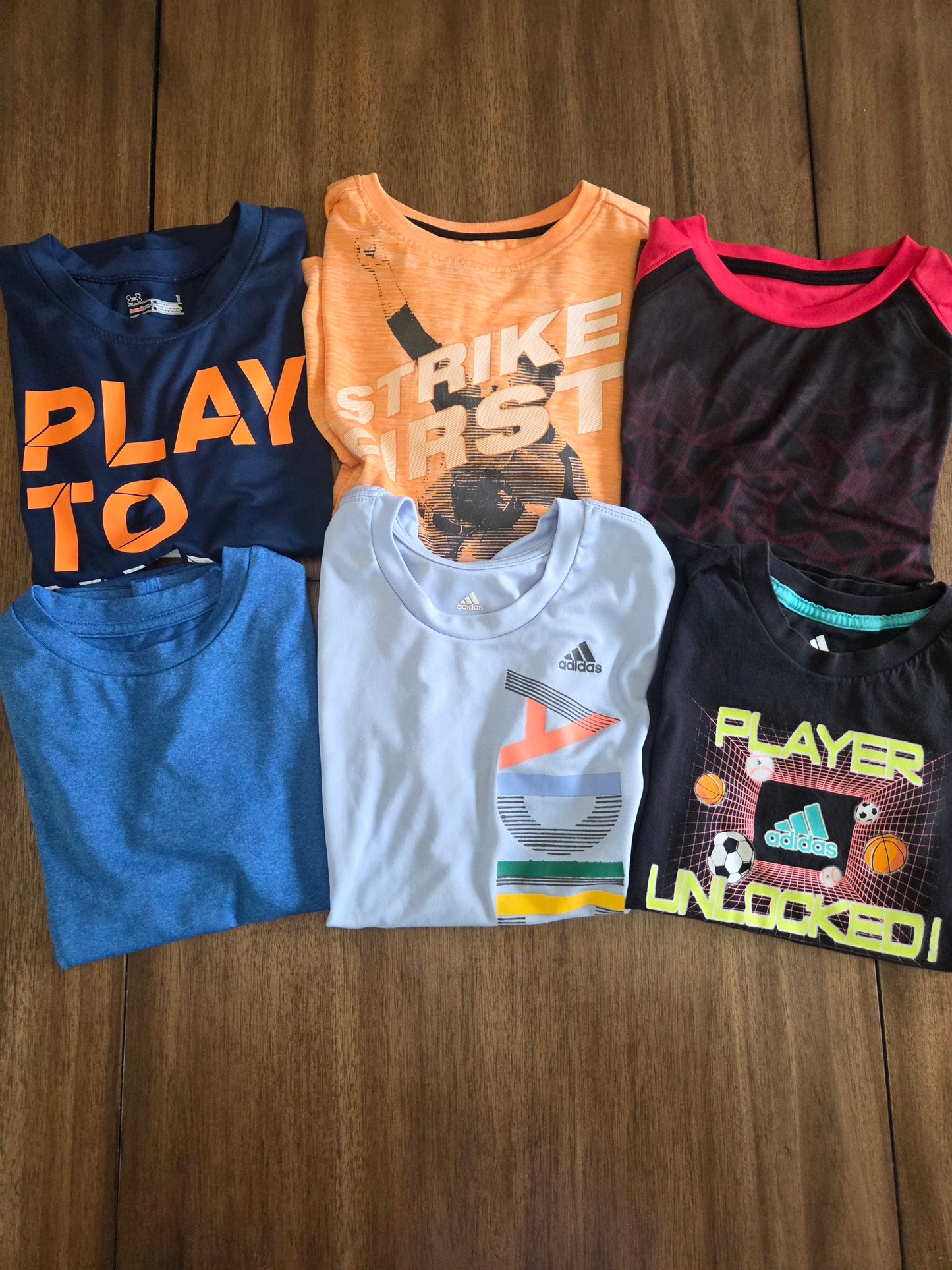 Seller 184 boys athletic tops size 6/7