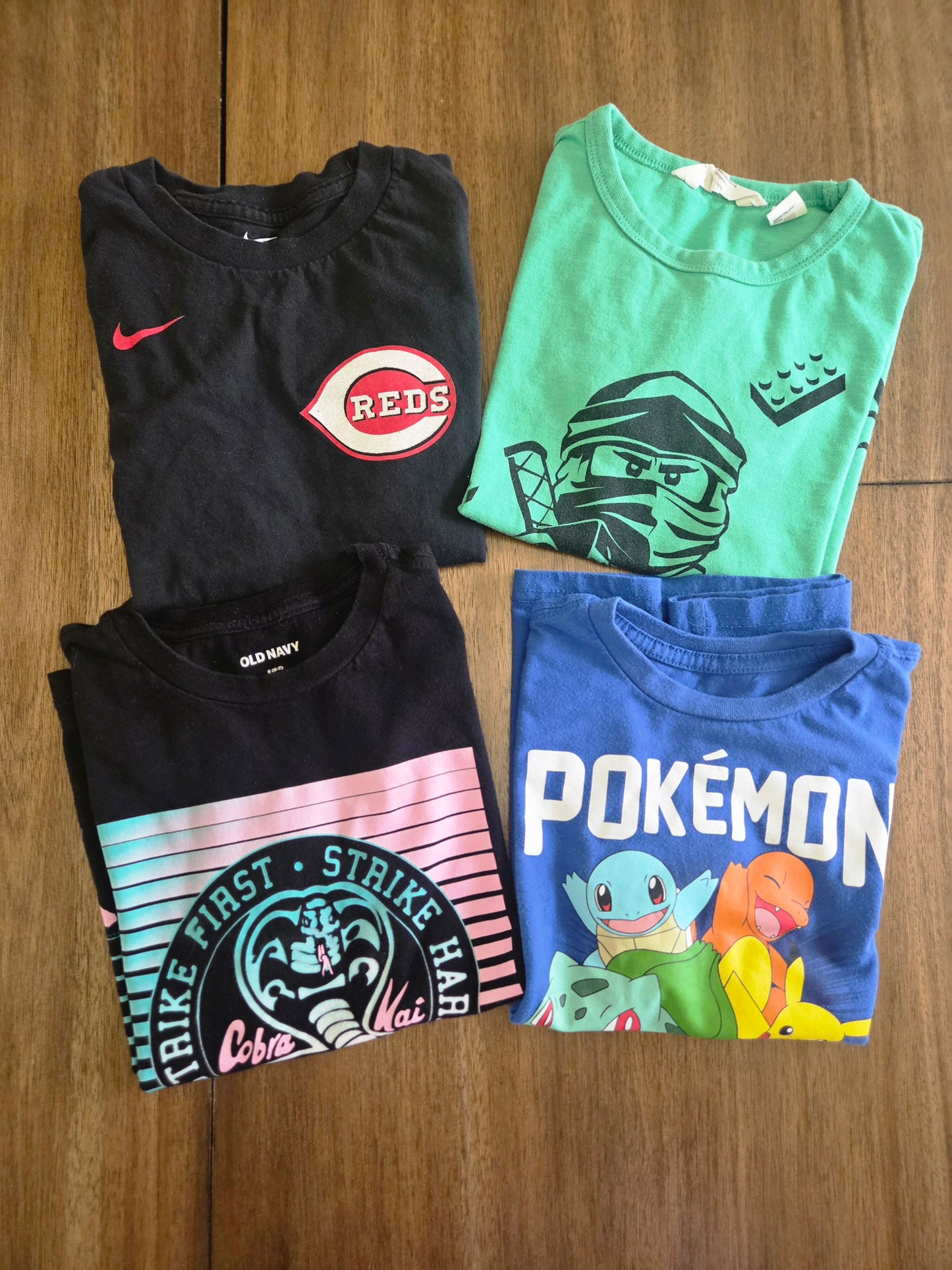 Seller 184 boys character and reds tops size 6/7