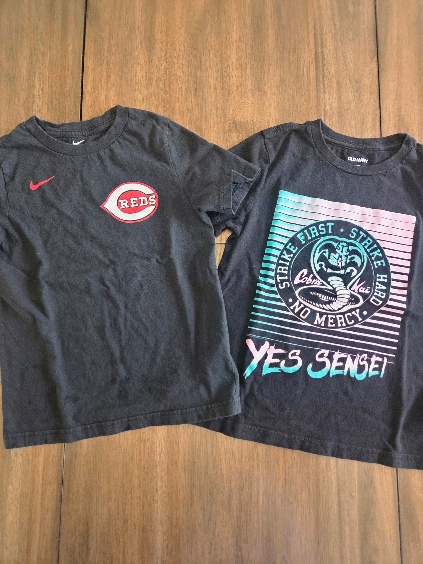 Seller 184 boys character and reds tops size 6/7