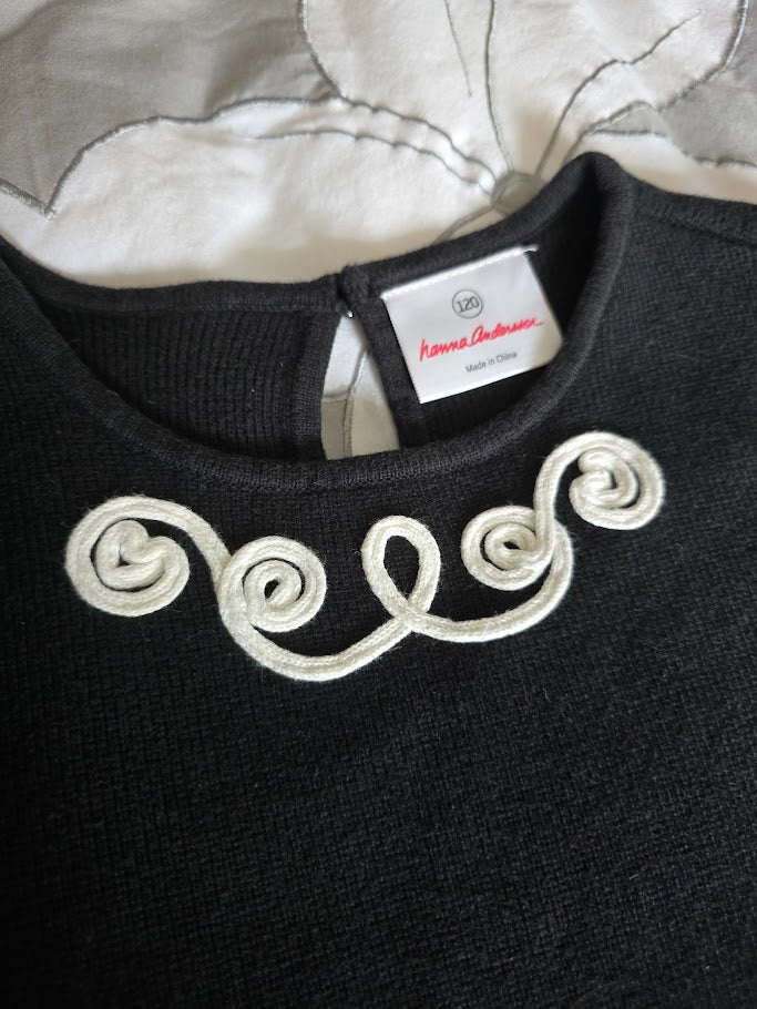 #131 Hanna Andersson black sweater dress with white design sz 120 (6 - 7)