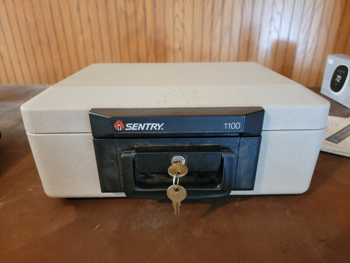 Seller #18 Sentry Fire Proof Safe with Key