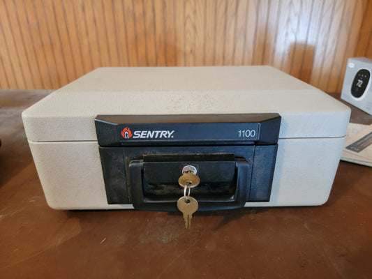 Seller #18 Sentry Fire Proof Safe with Key