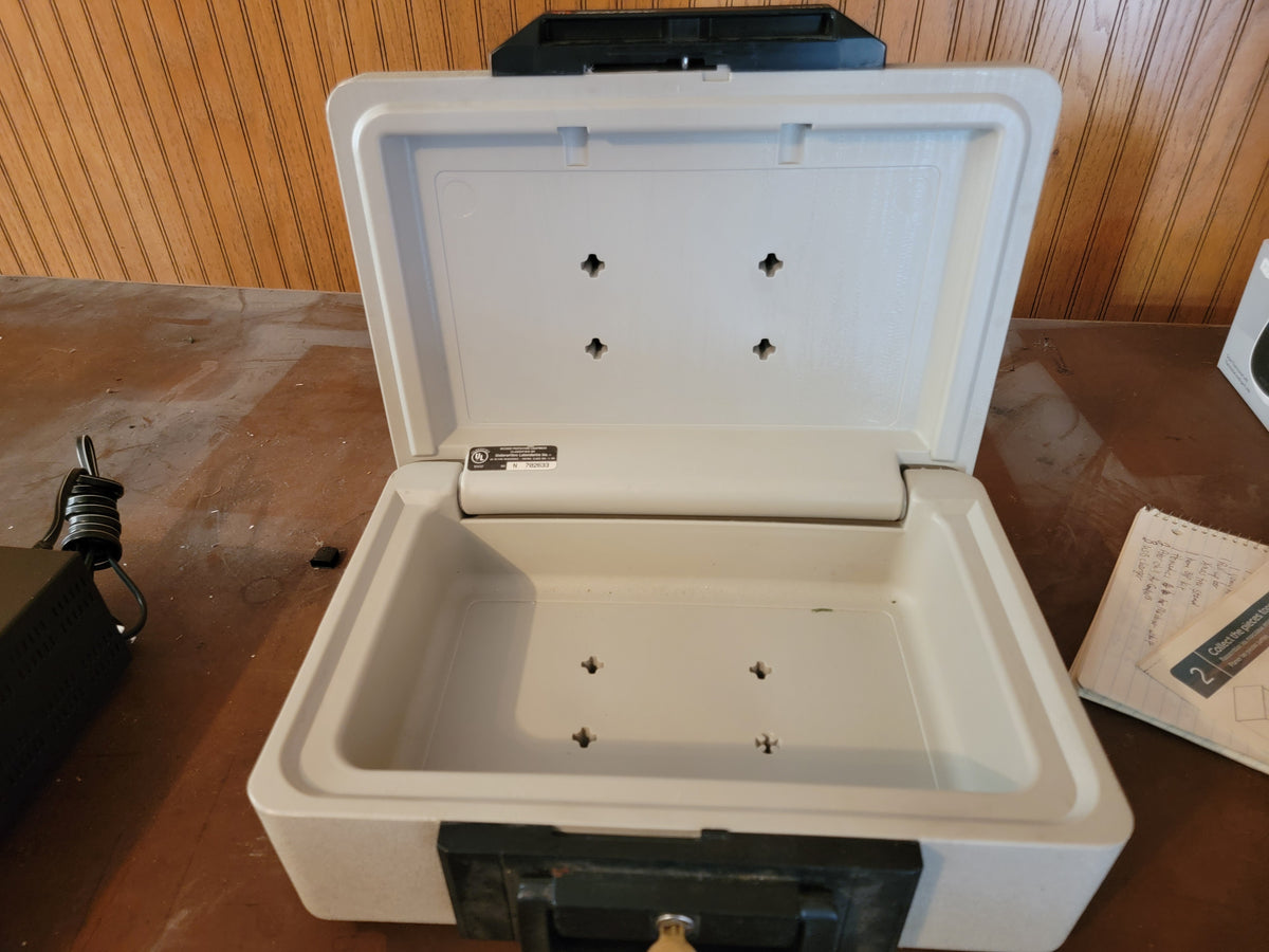 Seller #18 Sentry Fire Proof Safe with Key