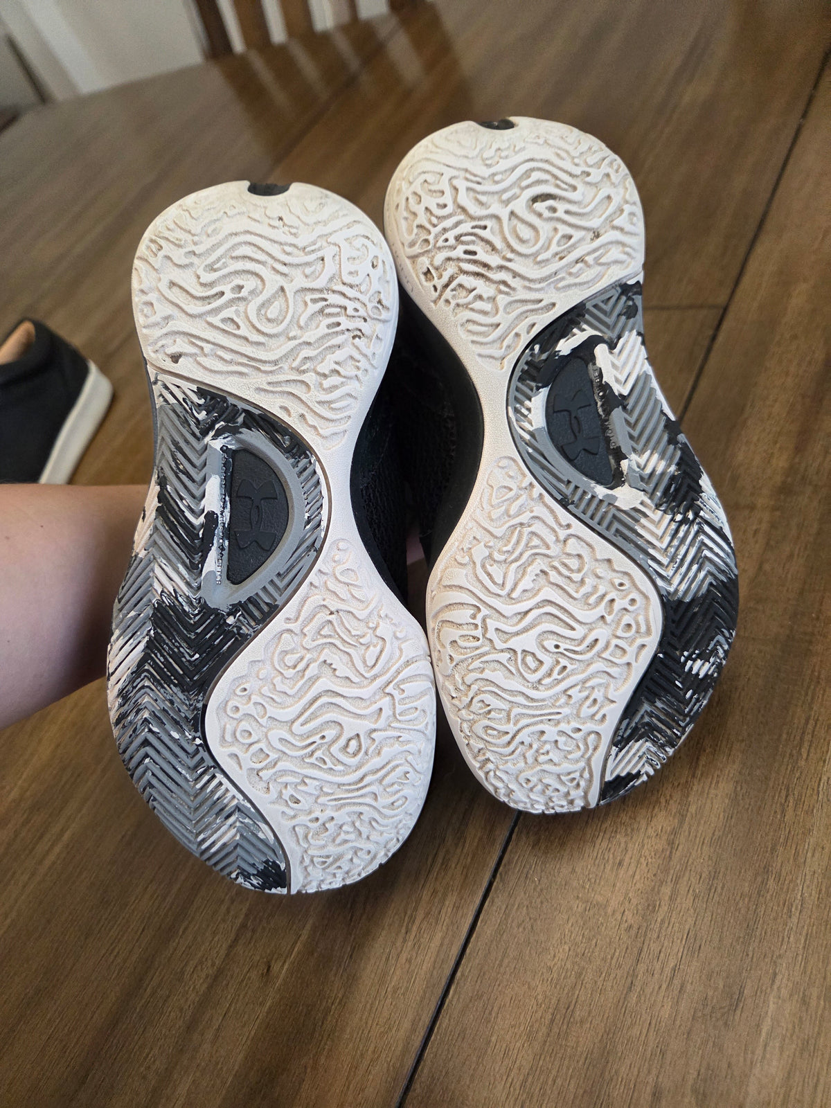 Seller 188 boys UA black and white basketball shoes size 1
