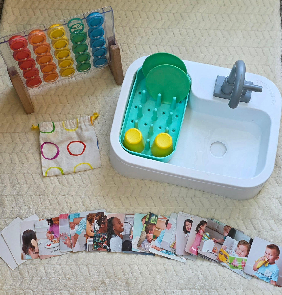 #190 Lovevery Helper Play Kit – Partial Set (Dot Catcher + Sustainable Sink + Routine Cards)