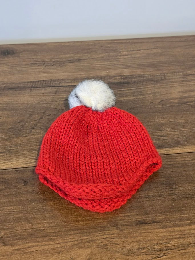 #131 Red knit hat with pom sz 0 -6M