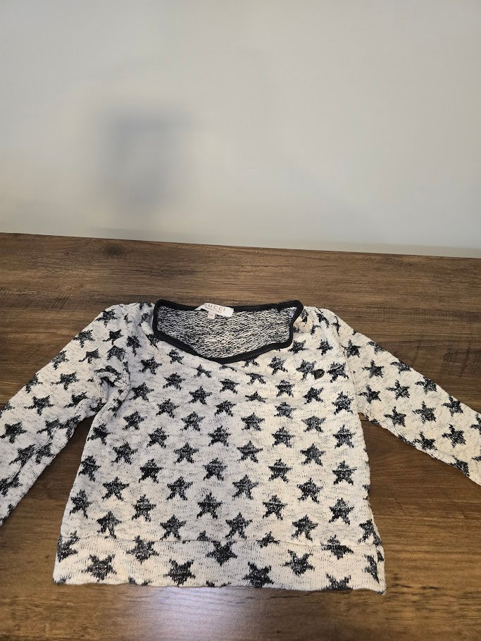 #131 Star sweater girls sz 6