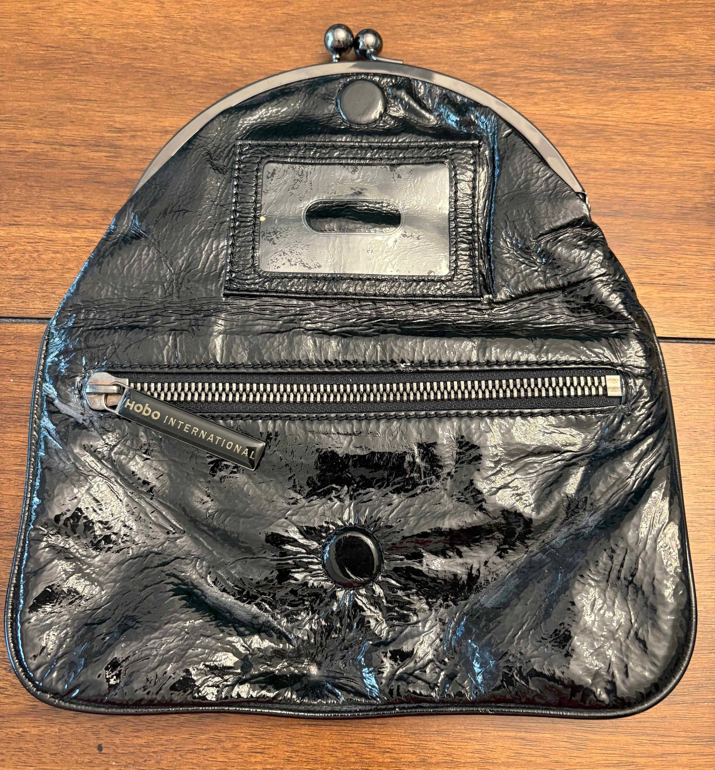 Seller #210 Hobo International Women's Black Leather Clutch